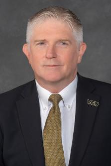 Headshot for John McHugh Director of Procurement Services