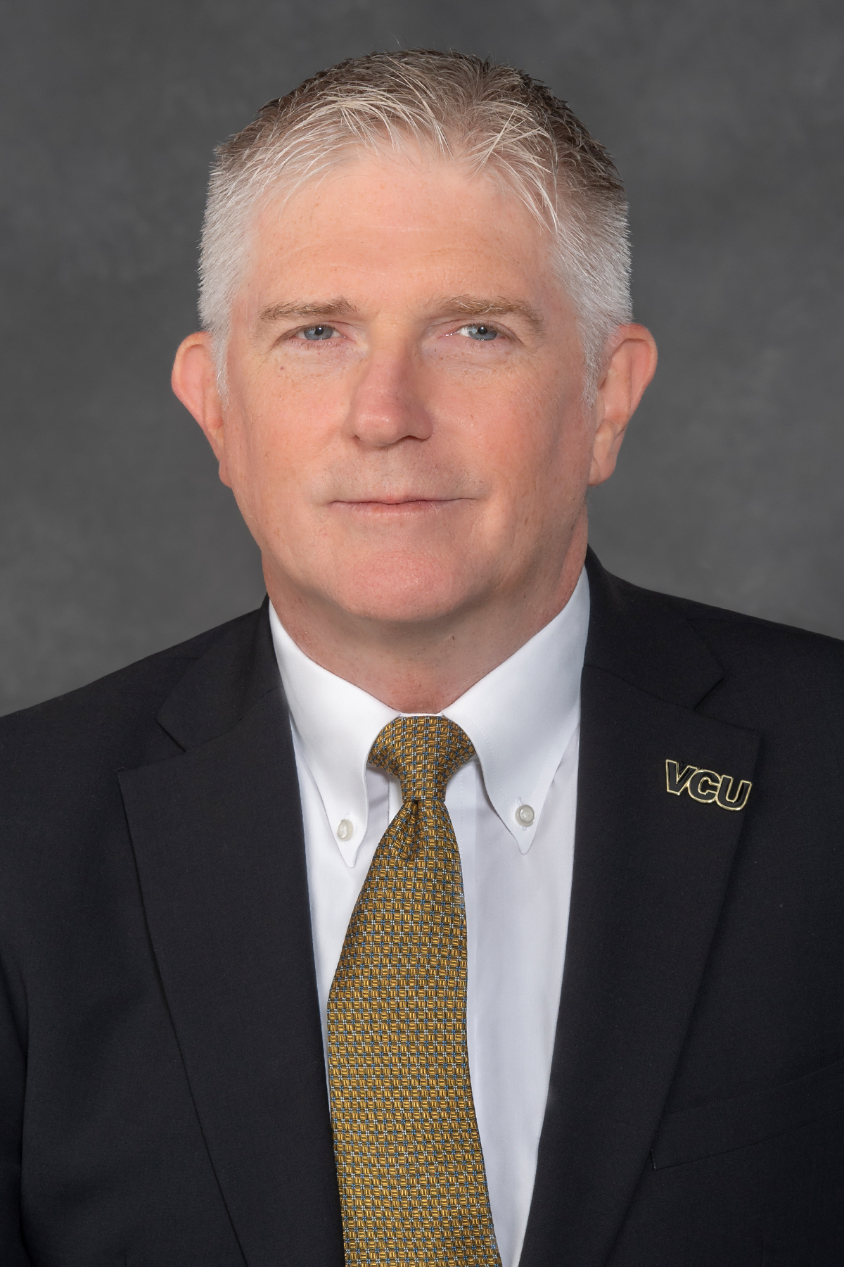 Headshot for John McHugh Director of Procurement Services